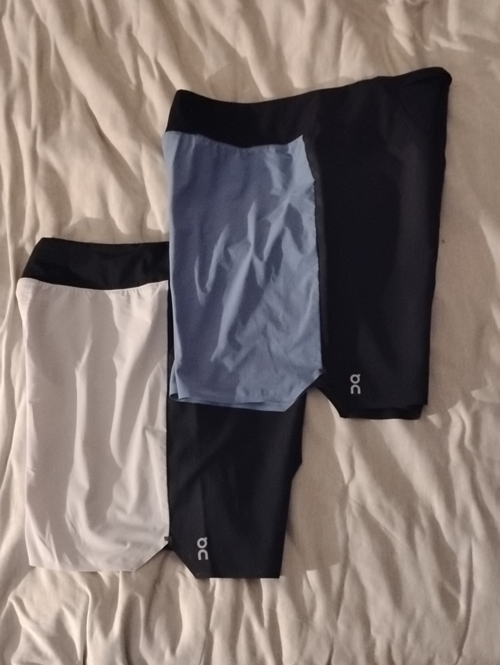 On Running Men's Athletic Shorts in Light Gray and Light Blue with Black Trim